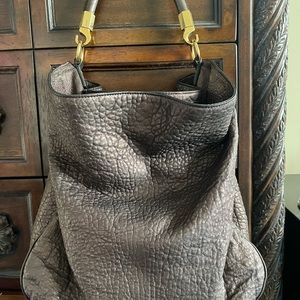 Yves Saint Laurent Roady Hobo Bag brown/copper metallic. Preowned.